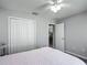 Cozy bedroom with closet and entry to another room at 7474 Se 172Nd Fieldcrest St, The Villages, FL 32162
