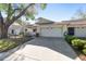 Well maintained single-story home with a spacious driveway, attached two-car garage, and charming front lawn at 9069 Sw 96Th Ln # B, Ocala, FL 34481