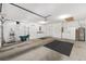 Spacious garage with ample storage, a utility sink, and access to the home at 9069 Sw 96Th Ln # B, Ocala, FL 34481