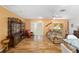 Inviting living room with laminate flooring and sliding glass doors to an outdoor space at 9069 Sw 96Th Ln # B, Ocala, FL 34481