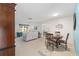 Bright living room with plush seating, natural light, and a view to the dining area at 9069 Sw 96Th Ln # B, Ocala, FL 34481
