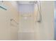 Shower with tiled walls, a built-in bench, and modern fixtures at 9069 Sw 96Th Ln # B, Ocala, FL 34481