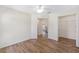 Bedroom features wood-look floors, closet and ceiling fan at 9541 Sw 93Rd Loop, Ocala, FL 34481