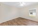 This bedroom is bright with wood-look floors and lots of natural light at 9541 Sw 93Rd Loop, Ocala, FL 34481