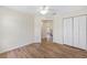 Bedroom with closet and wood-look floors at 9541 Sw 93Rd Loop, Ocala, FL 34481