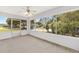 Screened patio with views of the front yard in a desirable community at 9541 Sw 93Rd Loop, Ocala, FL 34481