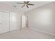 This bedroom has a double closet for storage and access to other parts of the home at 9697 Sw 102Nd Ter, Ocala, FL 34481