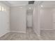 Hallway featuring neutral paint, tiled floors, and crown molding at 9697 Sw 102Nd Ter, Ocala, FL 34481