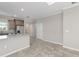 Well-lit kitchen flowing into the living area, featuring stainless steel appliances at 9697 Sw 102Nd Ter, Ocala, FL 34481