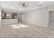 Open living area connecting to kitchen, with tile floors and access to other rooms at 9697 Sw 102Nd Ter, Ocala, FL 34481
