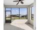 Screened-in patio featuring an open view of the neighborhood and a concrete floor at 9697 Sw 102Nd Ter, Ocala, FL 34481