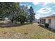 Expansive backyard featuring mature trees providing ample shade and privacy for outdoor enjoyment and relaxation at 10141 Sw 62Nd Terrace Rd, Ocala, FL 34476
