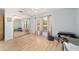 Bright bedroom with wood floor, ceiling fan, and a large window at 10575 Sw 27Th Ave, Ocala, FL 34476
