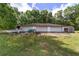 The property has a detached three-car garage offering ample space for vehicles and storage at 10575 Sw 27Th Ave, Ocala, FL 34476