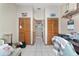 Hallway featuring a view of two closets at 10575 Sw 27Th Ave, Ocala, FL 34476
