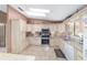Charming kitchen with granite countertops, stainless steel appliances, and ample cabinet space, perfect for culinary enthusiasts at 10575 Sw 27Th Ave, Ocala, FL 34476