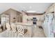 Well-equipped kitchen with ample counter space, cabinetry, and breakfast bar seating at 10575 Sw 27Th Ave, Ocala, FL 34476