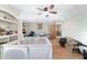 Cozy living room featuring built-in shelving and ample space for Gathering activities at 10575 Sw 27Th Ave, Ocala, FL 34476
