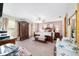 Spacious main bedroom boasts a ceiling fan and large windows at 10575 Sw 27Th Ave, Ocala, FL 34476
