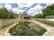 Backyard pool and fenced yard surrounded by mature trees providing privacy at 10575 Sw 27Th Ave, Ocala, FL 34476