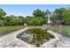 Outdoor pool needing maintenance surrounded by trees and grass at 10575 Sw 27Th Ave, Ocala, FL 34476