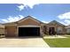 Well maintained one-story home with a manicured front yard at 13111 Se 86Th Cir, Summerfield, FL 34491