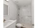 Bright bathroom featuring marble tiled walk-in shower and a modern sink at 13300 Sw 105Th Pl, Dunnellon, FL 34432