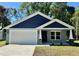 Charming single-Gathering home with a two-car garage and a well-manicured lawn at 13518 Sw 114Th Ln, Dunnellon, FL 34432