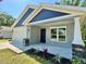 Beautiful single-Gathering home with a two-car garage, a walkway and a small garden at 13518 Sw 114Th Ln, Dunnellon, FL 34432