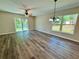 Spacious living room with natural light and sliding glass doors to the backyard at 13518 Sw 114Th Ln, Dunnellon, FL 34432