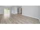 Spacious living area features sleek floors and neutral walls perfect for any decor at 15067 Sw 16 Pl, Ocala, FL 34481