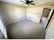 Bedroom featuring neutral walls, carpet, ceiling fan, and a window for natural light at 15585 Sw 46Th Cir, Ocala, FL 34473