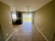 Bright dining area with tile flooring, modern light fixture, and slider to outdoor space at 15585 Sw 46Th Cir, Ocala, FL 34473