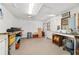 The interior of the shed with unfinished features, offering a versatile workspace at 16405 Se 90Th Ct, Summerfield, FL 34491