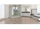 Bright bathroom featuring a glass shower, double vanity, and soaking tub at 1718 Sw 27Th St, Ocala, FL 34471