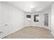 Bright bedroom with hardwood floors and access to patio at 1718 Sw 27Th St, Ocala, FL 34471
