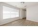 Bedroom with hard wood floors and a bright, large window at 1718 Sw 27Th St, Ocala, FL 34471