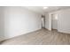 White bedroom with hardwood floors, and walk in closet at 1718 Sw 27Th St, Ocala, FL 34471