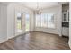 Dining area featuring natural light, doors to the yard, and views into the kitchen at 1718 Sw 27Th St, Ocala, FL 34471