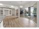 Living room with glass doors leading to a patio and swimming pool at 1718 Sw 27Th St, Ocala, FL 34471