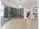 Living room with glass doors leading to a patio and backyard at 1718 Sw 27Th St, Ocala, FL 34471