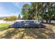 Solar panels positioned in the backyard provide an energy-efficient feature at 1718 Sw 27Th St, Ocala, FL 34471