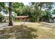Charming single-story home with a well-manicured front yard and an attached garage/carport at 2161 Ne 38Th St, Ocala, FL 34479
