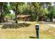 Charming single-story home with a well-maintained front yard and mature trees at 2161 Ne 38Th St, Ocala, FL 34479