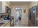 Well-lit kitchen features modern appliances and access to the laundry area for added convenience at 2161 Ne 38Th St, Ocala, FL 34479