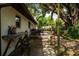 Outdoor patio with a table, chairs, and a sink, perfect for enjoying outdoor activities at 2161 Ne 38Th St, Ocala, FL 34479