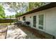 Charming patio with outdoor seating, offering a delightful space for relaxation at 2161 Ne 38Th St, Ocala, FL 34479