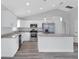 Modern kitchen featuring white cabinets, stainless steel appliances, and granite countertops at 2329 Sw 143Rd Ct, Ocala, FL 34481