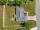Aerial view of the house showing the roof and lot in a suburban neighborhood at 27 Juniper Dr, Ocala, FL 34480