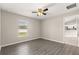 Bedroom with modern flooring, natural light, and neutral decor, creating a relaxing ambiance at 27 Juniper Dr, Ocala, FL 34480